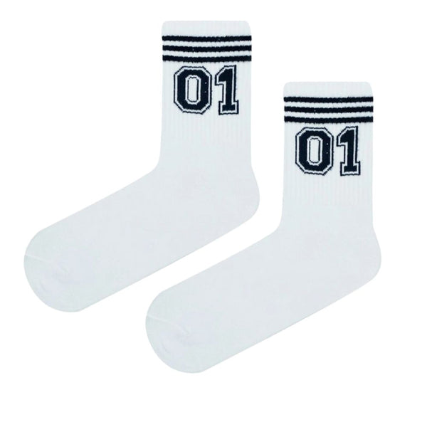 01 Varsity Crew Socks, featuring bold striped cuffs and a standout “01” emblem that brings classic athletic vibes to your everyday look.