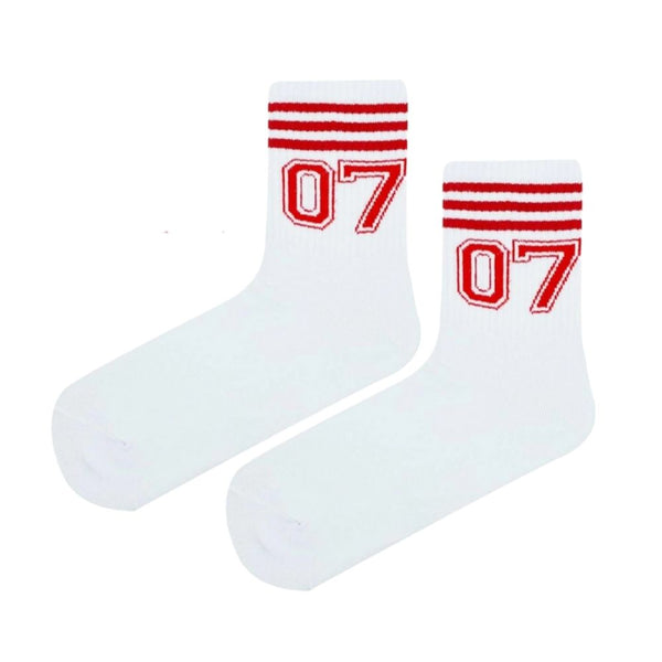 07 Varsity Crew Socks. With bold red stripes and a sporty number design, these socks deliver vintage athletic energy and all-day comfort.
