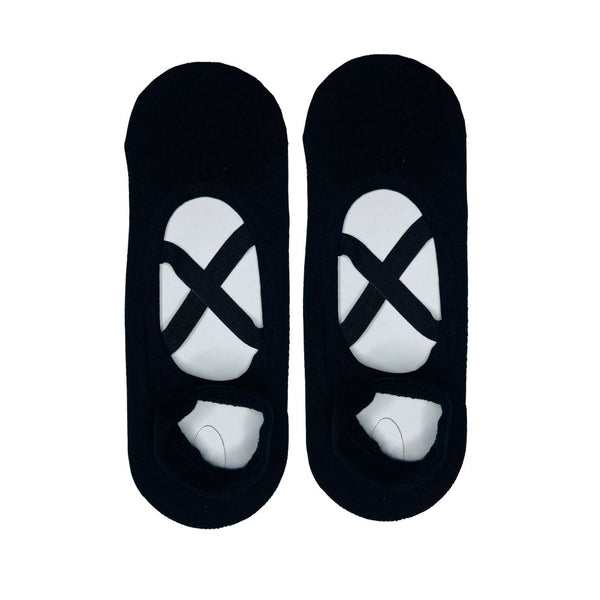 Black Yoga Sports Grip Socks. Designed with high-traction silicone dots, these socks provide superior grip for yoga, pilates, barre, and home workouts.