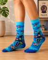 Blue crew socks featuring a fantasy wizard with star and moon hat surrounded by red mushrooms