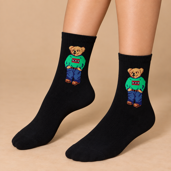 Black crew socks with teddy bear wearing green sweater and blue jeans