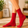 Classic solid red crew socks with a clean minimalist design