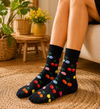 Black crew socks with colorful cherry fruit pattern design