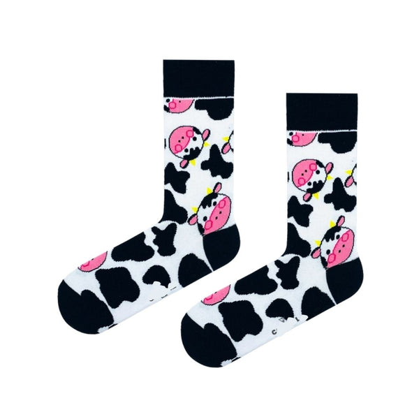 Cute Cow Patterned Socks! Featuring a black and white cow pattern with adorable pink cow faces