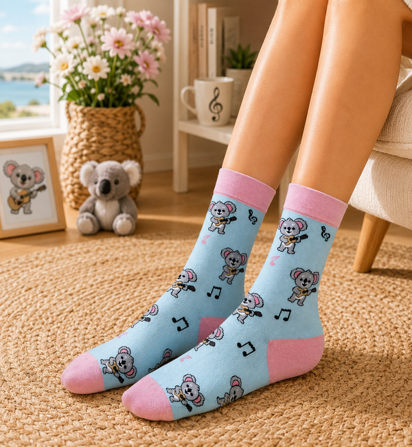 Pastel blue crew socks with cute koala guitar and music note pattern with pink cuffs