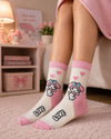 White and pink crew socks featuring cute My Melody cartoon artwork with pink hearts and kawaii pastel design
