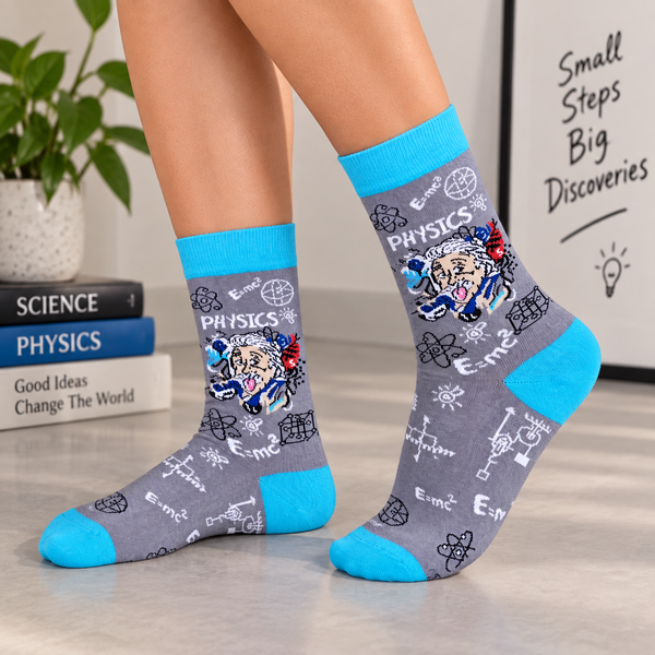 Grey and blue crew socks featuring Einstein with physics formulas and science illustrations