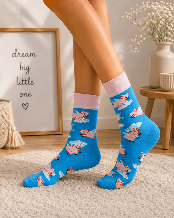 Blue socks with flying pig and cloud cartoon pattern design