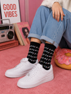 Black Friends inspired crew socks with repeated TV show logo pattern