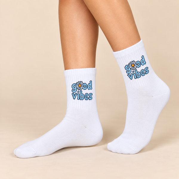 White crew socks with blue Good Vibes tex