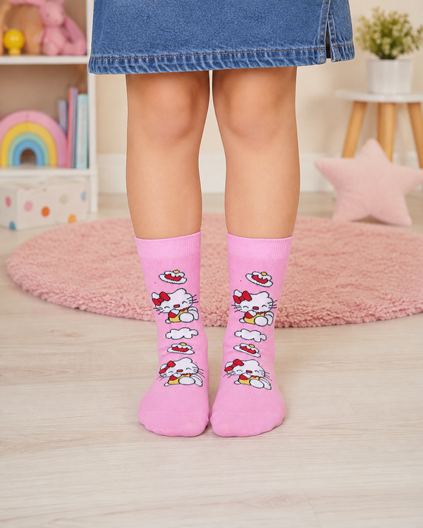 Pink Hello Kitty kids crew socks for 5–6 years featuring cute Hello Kitty characters with clouds and dessert-themed designs.