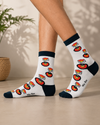 White crew socks featuring kanafa dessert illustrations on a food-themed design.