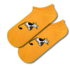 Lazy Cat Ankle Socks, featuring a cute black and white cat lounging on a vibrant yellow base.