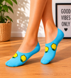 Blue invisible socks featuring yellow lemon patterns designed to stay hidden inside shoes.