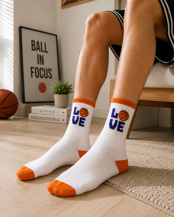 White basketball crew socks with LOVE text and orange basketball design