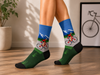 Mountain Cyclist Socks with road bike rider and mountain scenery design on crew socks.