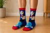 Blue and red Popeye cartoon crew socks with classic sailor character design