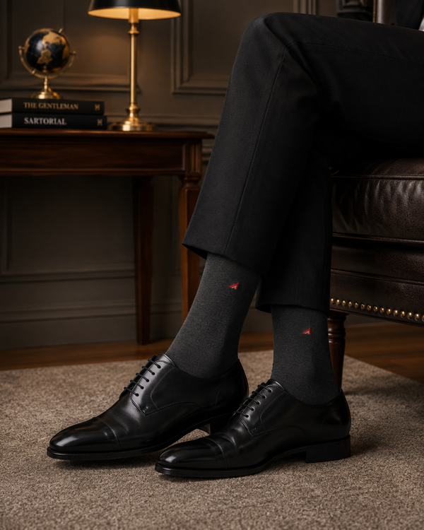 Premium charcoal formal crew socks with subtle triangle logo made from breathable soft cotton blend for office and business wear.
