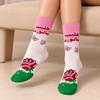 Rose Milk Socks featuring Arabic حليب بالورد lettering, pink cuffs, red and pink roses, butterfly patterns, white background and green toes. Copy