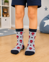 Grey Spider-Man kids crew socks for children aged 5–6 years featuring an all-over Spider-Man mask and black star pattern.