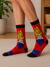 Red anime socks featuring Super Saiyan Goku character with golden hair and blue outfit details.