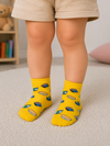 Yellow sushi pattern socks for toddlers aged 2–3 years with colorful sushi illustrations.