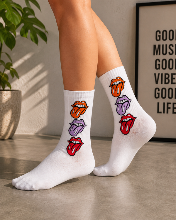 White crew socks with colorful orange, purple, and red pop art lip illustrations.