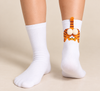 White crew socks with orange cat design and 3D pompom details on the back