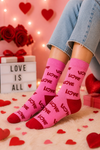 Pink crew socks with LOVE text pattern and red toe and heel, unisex cotton socks