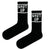 Shut Up Socks – Black Edition. These eye-catching crew-length socks feature a daring design with the words “SHUT UP” boldly stitched on both sides, perfect for those with a cheeky sense of humor.