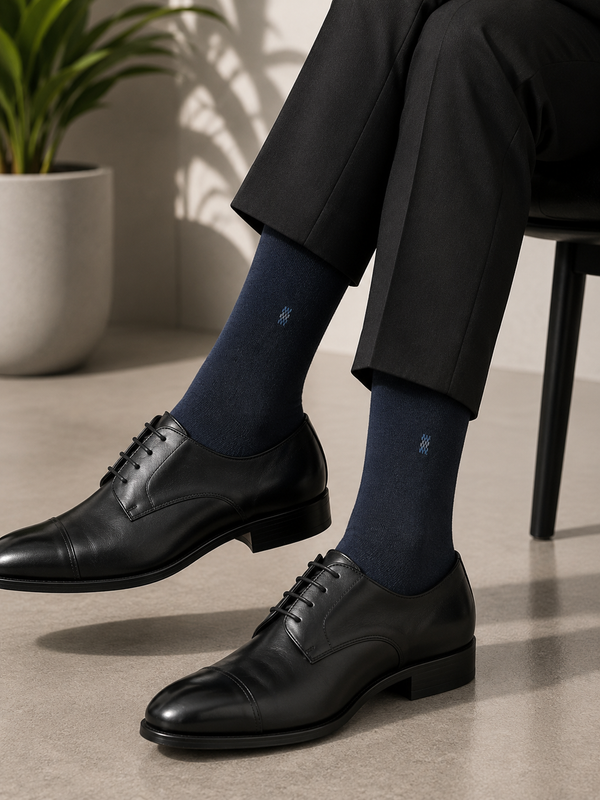 Charcoal bamboo dress socks with an embroidered Bambu Argyle Logo and seamless crew-length design.