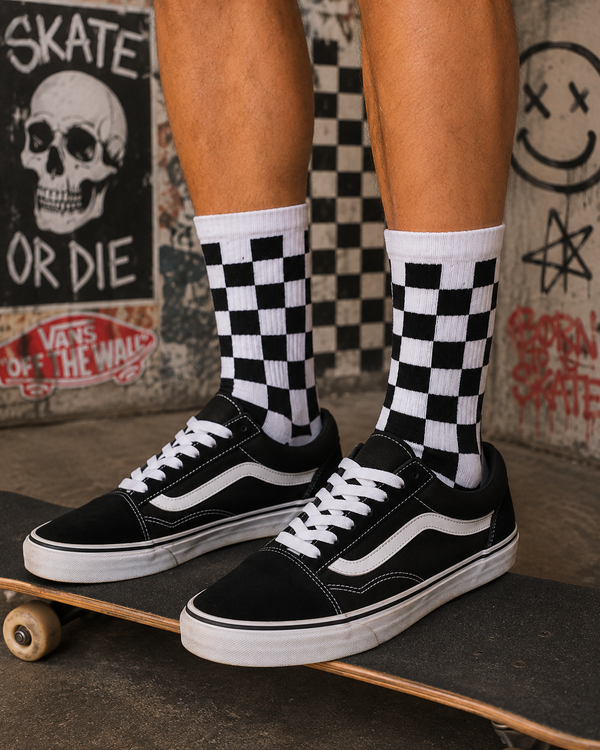 Black and white checkerboard pattern crew socks with retro skate-style design.