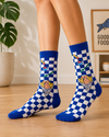 Blue and white checkered crew socks featuring fish and chips, green fork and sauce illustrations