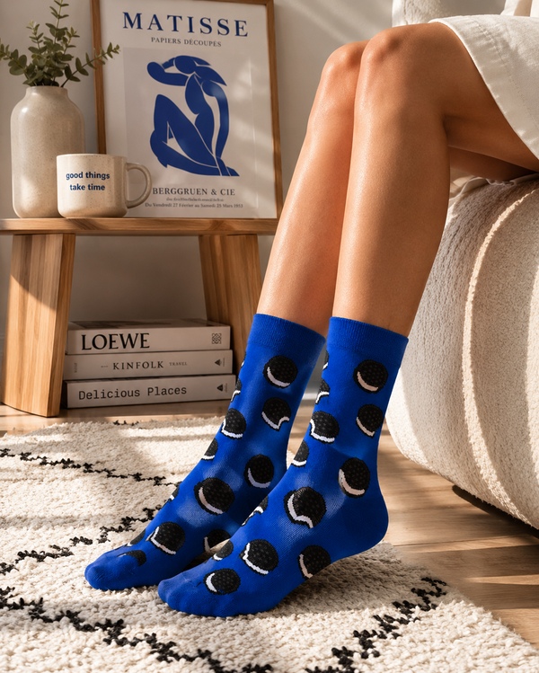 Blue crew socks with black and white cookie pattern design