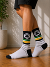 Boston Celtics crew socks with shamrock logo and green, gold, black stripe design.