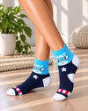 Blue Captain Shield low cut socks with superhero face, white star and red striped details