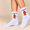 White crew socks with running carrot character and red Carrate text