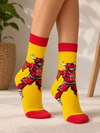 Yellow crew socks featuring Benny the Bull, the Chicago Bulls mascot, wearing a red basketball uniform.