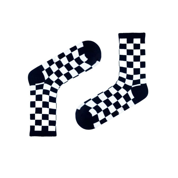 Classic Checkerboard Socks. Featuring bold black and white squares in a retro racing-inspired design, these unisex socks add edge to any outfit.