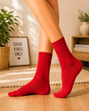 Classic solid red crew socks with a clean minimalist design
