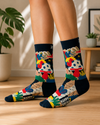 Dark navy crew socks featuring colorful mushrooms, flowers, plants and abstract nature artwork