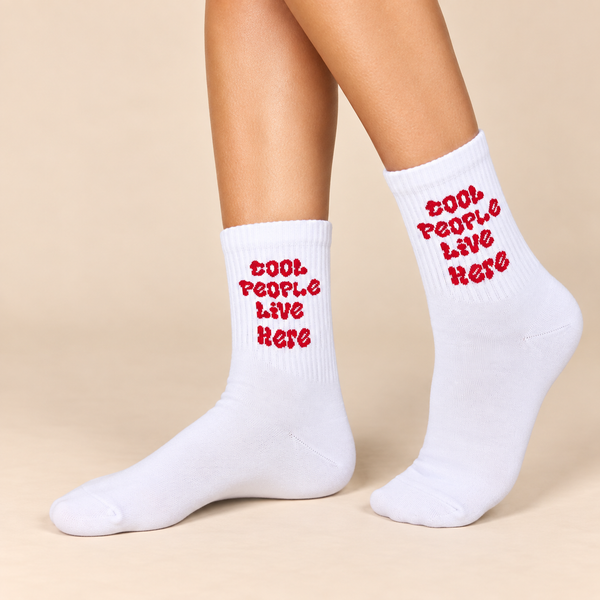 White crew socks with red Cool People Live Here slogan