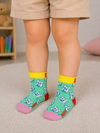 Mint green kids crew socks with cute blue dog pattern, yellow cuff, red heel, and pink toe for toddlers aged 2–3 years.