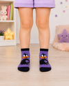 Purple Daffy Duck kids crew socks for children aged 3–4 years featuring a large Daffy Duck character design with black cuffs and toe.