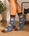 Fluffy Cat and Yarn Ball Socks with cute cat illustrations on blue background crew socks.
