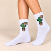 White crew socks with green cactus holding a Free Hugs sign