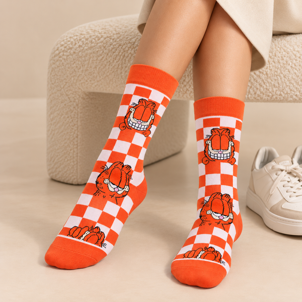 Orange and white checkerboard crew socks featuring multiple Garfield cartoon expressions
