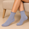 Grey ribbed ankle socks with delicate ruffle cuffs