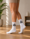White crew socks with black Gym King graphic and crown design