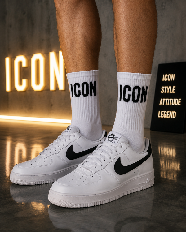White crew socks with bold black ICON text design near the top.